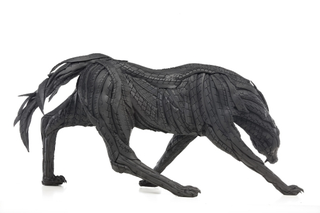 Illustration for article titled This Artist Turns Old Tires Into Dark, Disturbing Nightmare Monsters